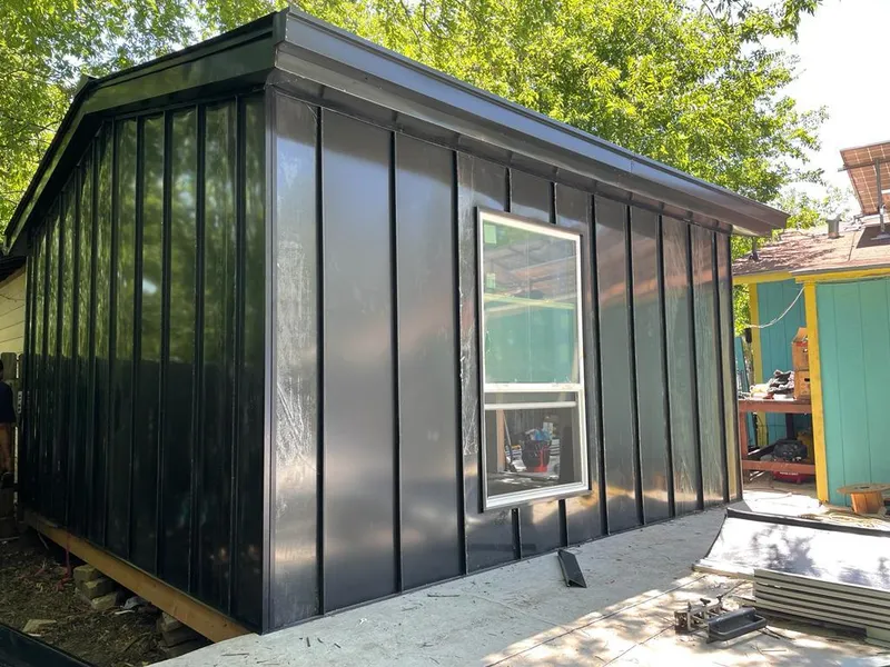 Black standing seam metal wall panels for Metal Roof Installation in Naples Manor