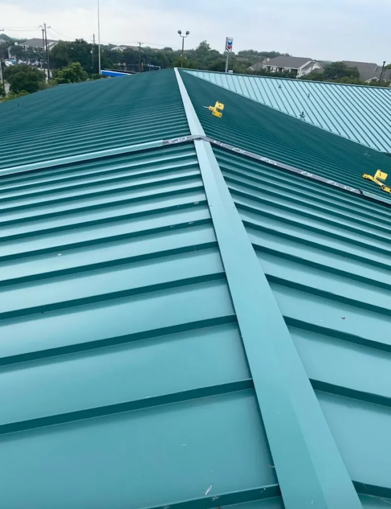 Green commercial metal roof ridge and valley for Metal Roof Repair in Naples Manor
